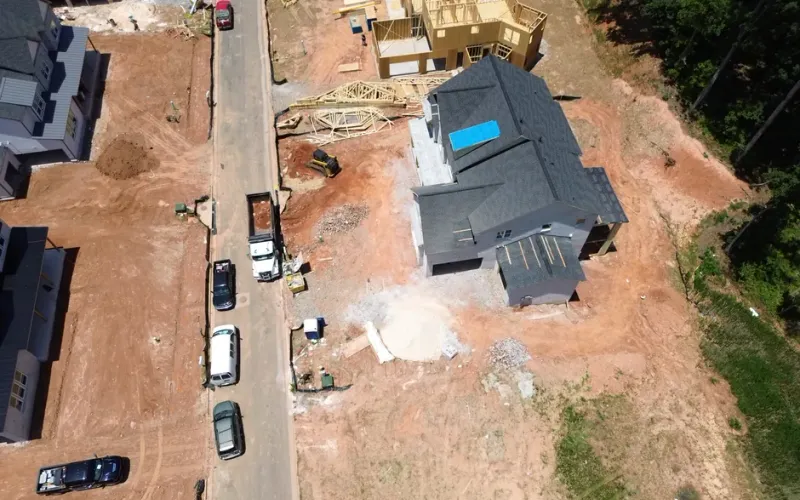 Best Sandy Springs Roofer team performing a free roof inspection on a residential home in Sandy Springs, GA